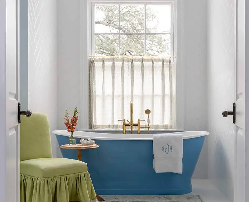 Brenham Farmhouse master bathroom tub.webp