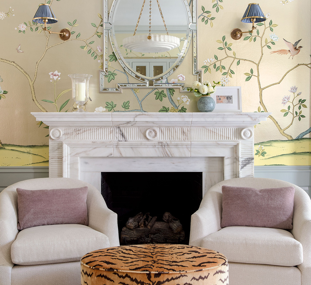 Parlor with fireplace and two chairs